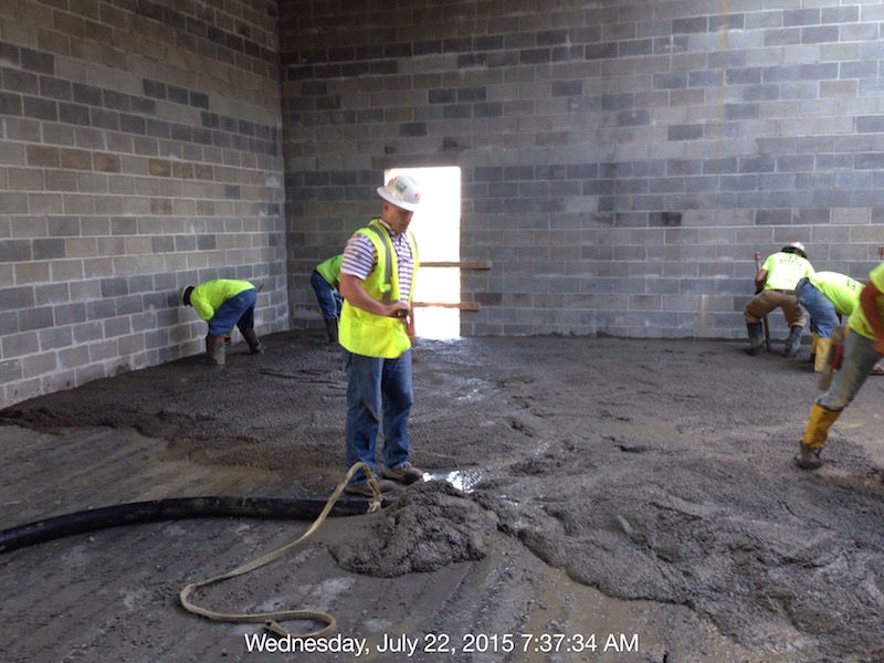 Workers Pouring Concrete