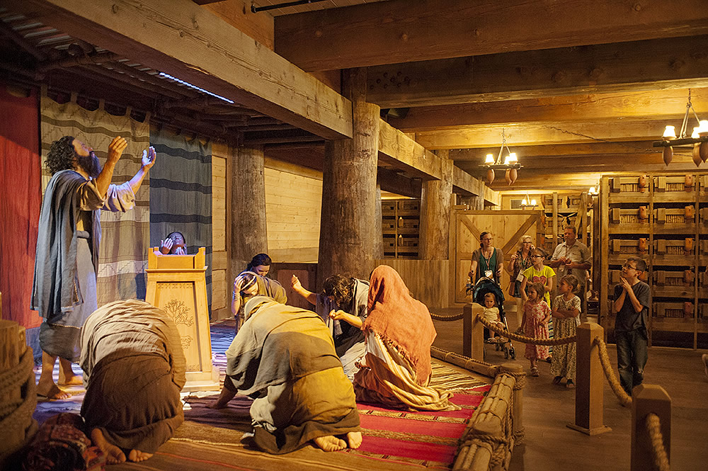 Noah praying with family