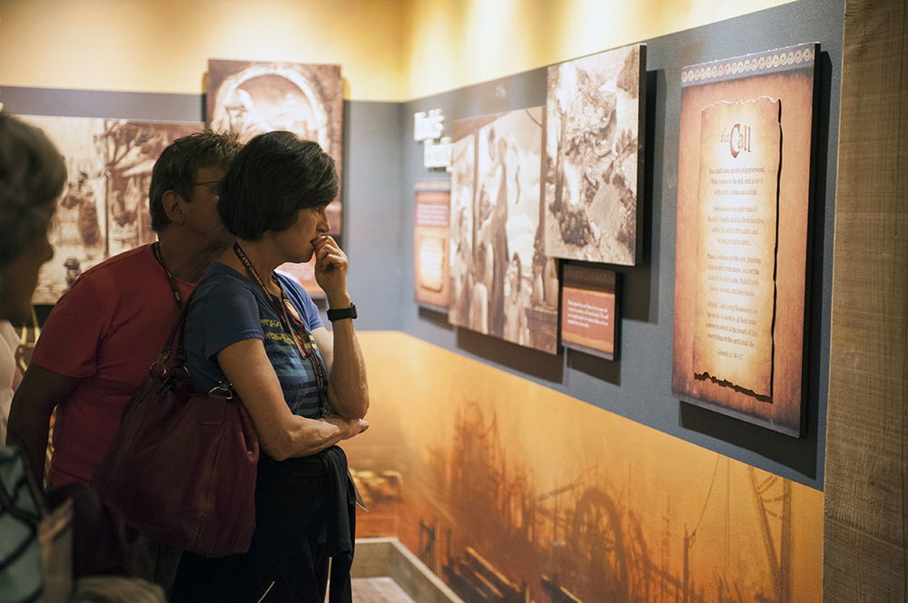 Guests Reading Signs at the Ark Encounter