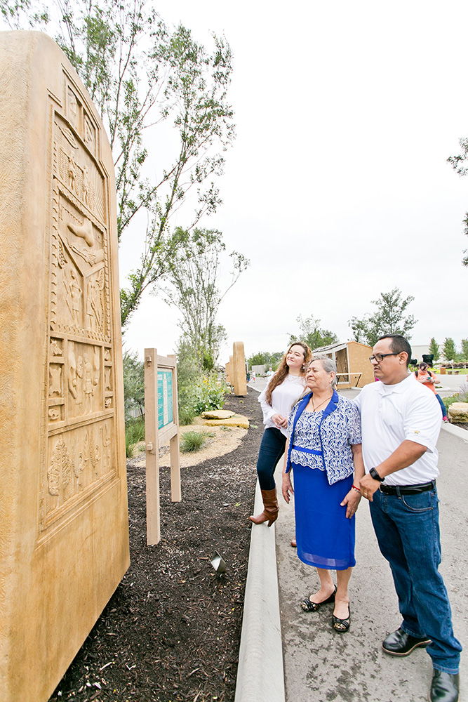 Family Looking at Stele in Monument Walk