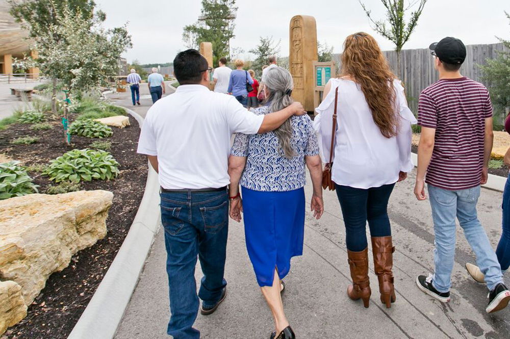 Family Walking Through Monument Walk