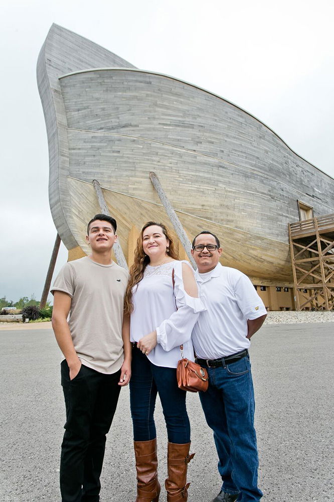 Family Photo in Front of Bow