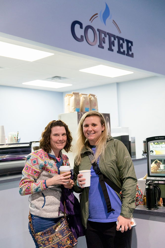 Guests with Coffee in Answers Center