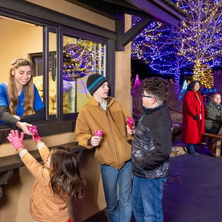 kids getting some snacks outside