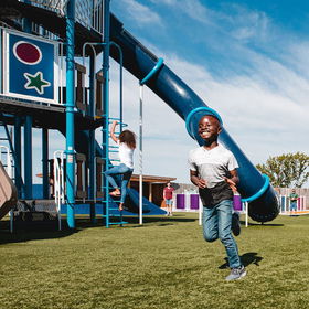 kids playing on playground outside ark