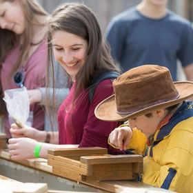 family looking at fossils